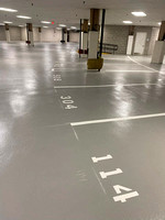 30k sf parking garage HERMETIC™ Stout, moisture barrier ul7, base with full sand broadcast PT4 Uretane top coat by Boston Concrete Artisans 1
