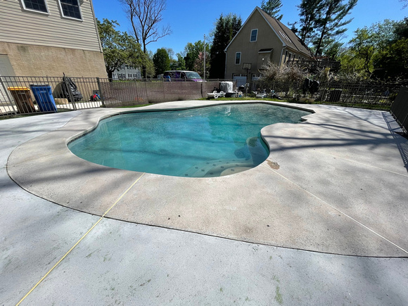 Pool deck using THIN-FINISH™ Decorative Overlay with custom stars to create a unique look by DCE Flooring LLC 17