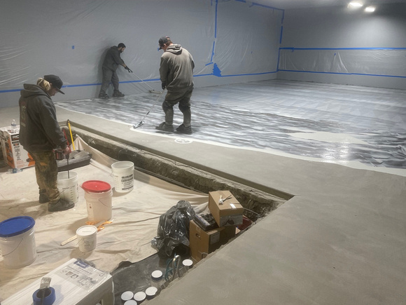 Private warehouse3,500 sf charcoal pearl over medium gray base by Ace Dragon Coatings & Foam Inc.  5