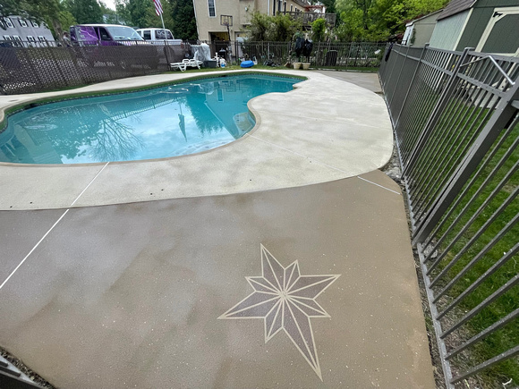 Pool deck using THIN-FINISH™ Decorative Overlay with custom stars to create a unique look by DCE Flooring LLC 7