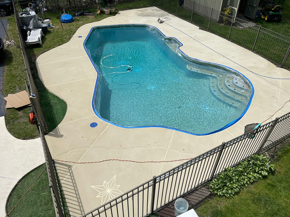 Pool deck using THIN-FINISH™ Decorative Overlay with custom stars to create a unique look by DCE Flooring LLC 12