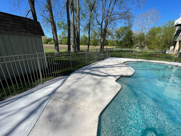 Pool deck using THIN-FINISH™ Decorative Overlay with custom stars to create a unique look by DCE Flooring LLC 18