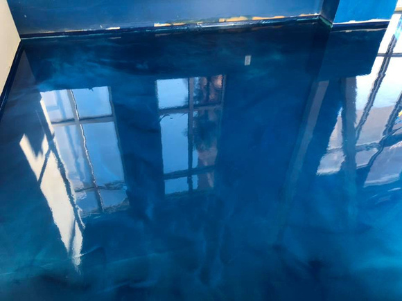 The Reef tanning salon ECS blue over custom teal base reflector by Titan Coatings @titancoatingsutah - 5
