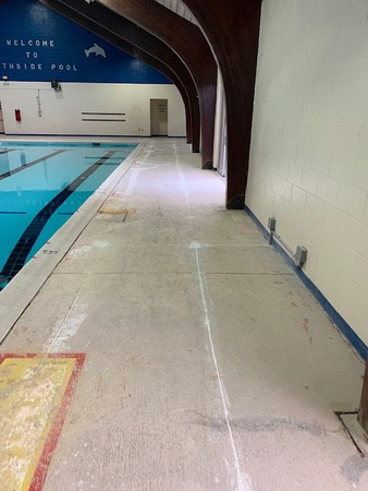 Norfolk, VA indoor pool deck knock down Thin-finish and ccs with stenciled depth markers by Distinguished Designs Decorative Concrete Coatings and Epoxy Floors @ddconcrete.net - 12