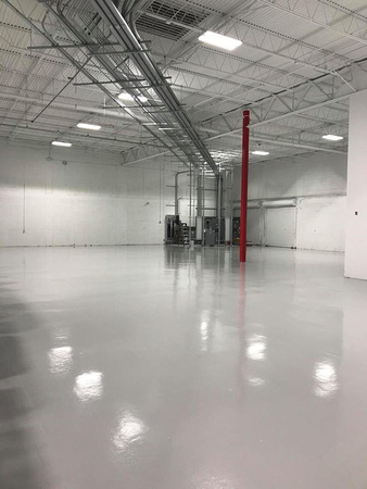 #70 Neat warehouse by Superior Floor Coatings, LLC 1