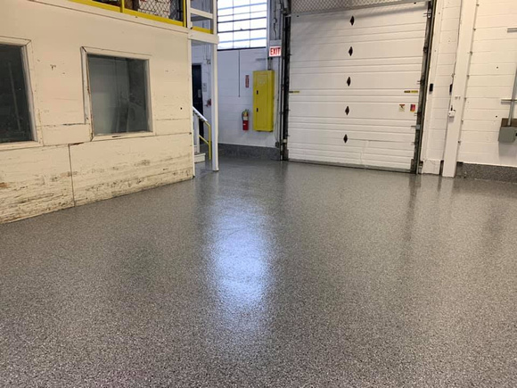 Able Electropolishing in Cicero, IL warehouse flake by American Floor Coatings - 1