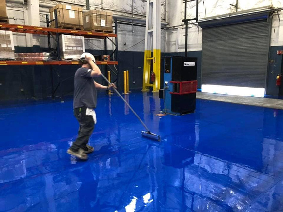 Aker Subsea warehouse 85k sf blue neat custom RAL 5005 color by Hopkins Fooring LLC - 2