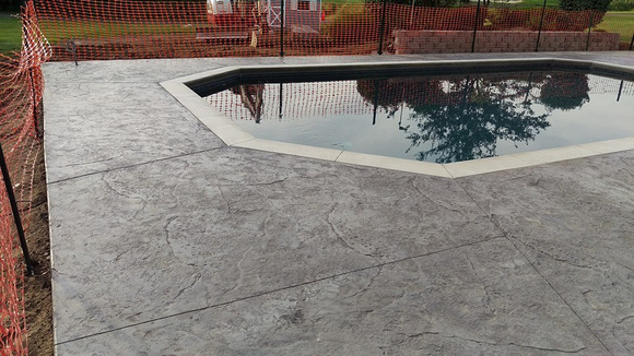 Natural stone pool deck by Hoffman Stamped Concrete LLC - 2