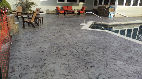 Natural stone pool deck by Hoffman Stamped Concrete LLC - 6