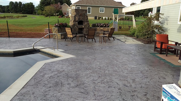 Natural stone pool deck by Hoffman Stamped Concrete LLC - 7