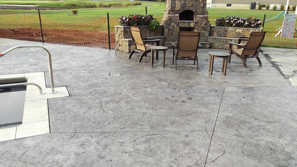 Natural stone pool deck by Hoffman Stamped Concrete LLC - 8