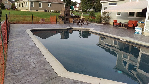 Natural stone pool deck by Hoffman Stamped Concrete LLC - 9