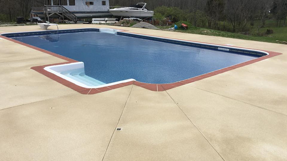 Pool with brick border by Grant's Custom Coatings @creativeconcreteoverlays - 1