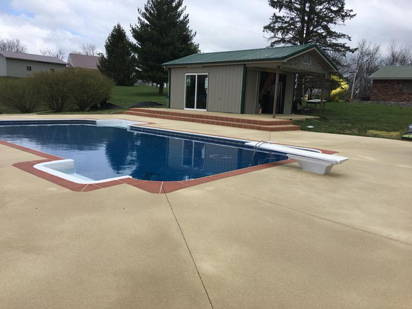 Pool with brick border by Grant's Custom Coatings @creativeconcreteoverlays - 4