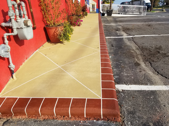 Sidewalk at La Hacienda Hot Springs AR @laha88 thin-finish with brick border by E&B Diamond Crete inc. @decorative.concrete.ar - 1