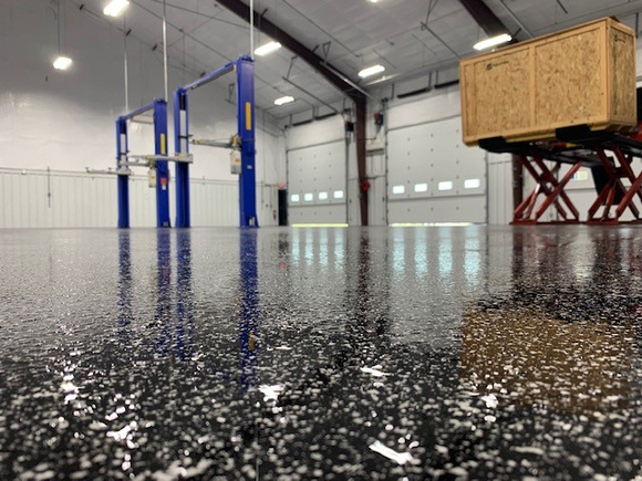 The Metal Shop - Monster Truck Fabrication facility flake by Distinguished Designs Decorative Concrete Coatings and Epoxy Floors @ddconcrete.net - 1