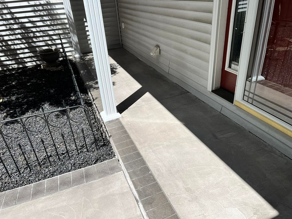 Decorative Concrete Overlay installed sidewalk and fronmt porch in Wildwood, Missouri by Extreme Floor Coatings, LLC 1
