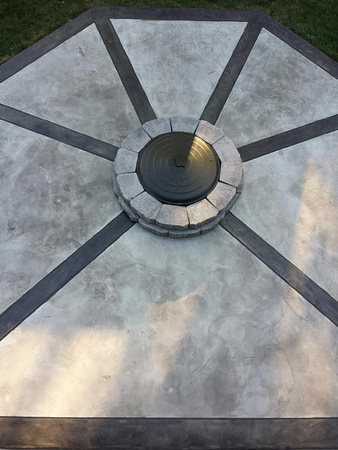 Patio in Inver Grove Heights, MN thin-finish hand troweled texture stained with light oxford gray and charcoal gray borders by Concrete Dynamics @concretedynamics2016 - 2