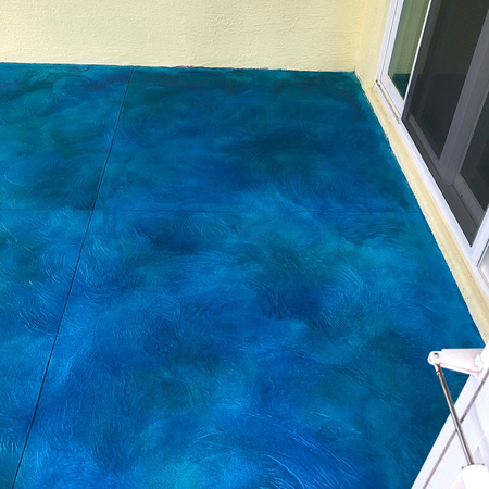 Blue overlay porch by Rock Solid Resurfacing and Removal