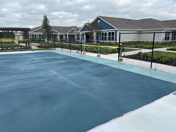 Pickleball court thin-finish PCC blue slate with green slate border with 3 gazebo areas thin-finish by Texas Concrete Design - 7