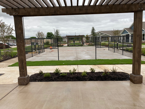 Pickleball court thin-finish PCC blue slate with green slate border with 3 gazebo areas thin-finish by Texas Concrete Design - 11