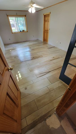 HOP Wood plank Cement Overlay and HERMETIC™ Flake by Custom Concrete Coatings 2