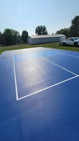 Pickel ball court installed on Ottertail Lake by Custom Concrete Coatings 5