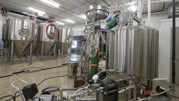 New photos We Brewing Company in Geneva, New York HERMEETIC™ Flake by Shuttleworth Asphalt Sealing 6