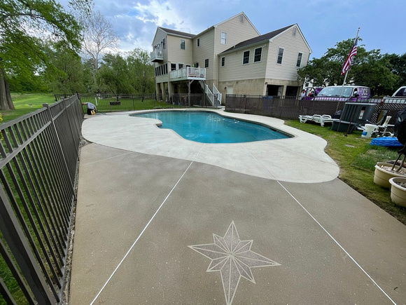Pool deck using THIN-FINISH™ Decorative Overlay with custom stars to create a unique look by DCE Flooring LLC 1