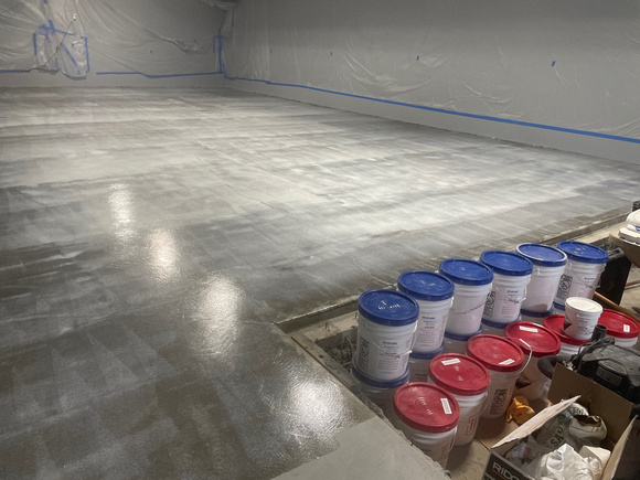 Private warehouse3,500 sf charcoal pearl over medium gray base by Ace Dragon Coatings & Foam Inc.  3