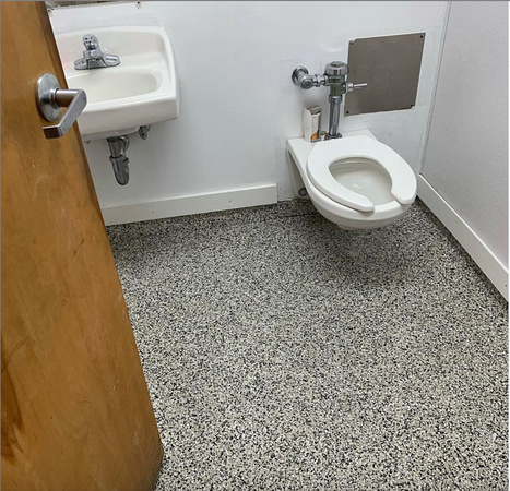 Corporate office bathroom flake by Luis Saravali with Hardwood Flooring Preferred - 3