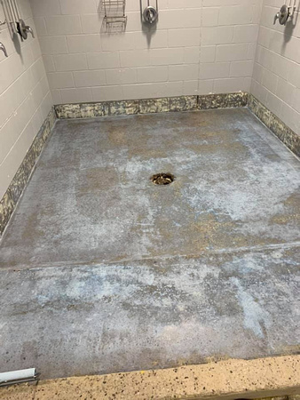 Shower units at Thomas Creek ice arena step by step-1-Grinded of exsisting coatings 2-preceptor 3-Vb5 4-pt4 double broadcast 5-pt4 grout coat 6-Ausv 7-safety yellow by Avella painting inc - 5