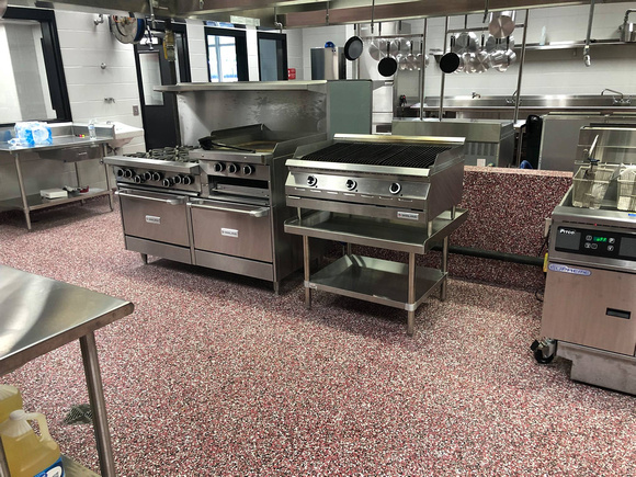 Culinary school kitchen red flake wall by All Phase CPI Inc. @AllPhaseCPI.com.EliteCrete - 2