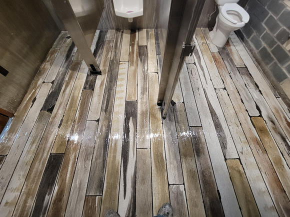 Commercial bathroom at a brewery hw overlay by Elite Crete LLC  4