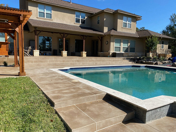 Patio & pool deck thin finish skip troweled texture with PCC Buff and Chocolate by Texas Concrete Design 3