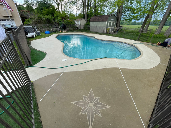 Pool deck using THIN-FINISH™ Decorative Overlay with custom stars to create a unique look by DCE Flooring LLC 4