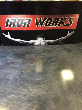 Iron Works in Enid OK reflector after removal of 1 layer of carpet and 2 layers of vinyl tile gunmetal & titanium Simpson Custom Concrete 1