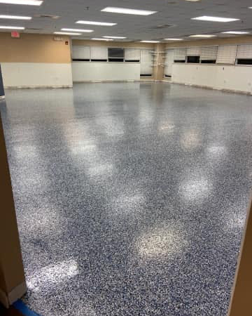 A physical therapy center chose to specify a HERMETIC™ Flake Floor throughout their facility Northwest ecs 3