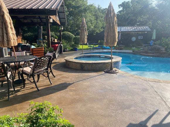 Pool deck coatings THIN-FINISH™, Troweled Texture Chocolate with ultra-stone accent sealed w: CSS by Texas Concrete Design   3