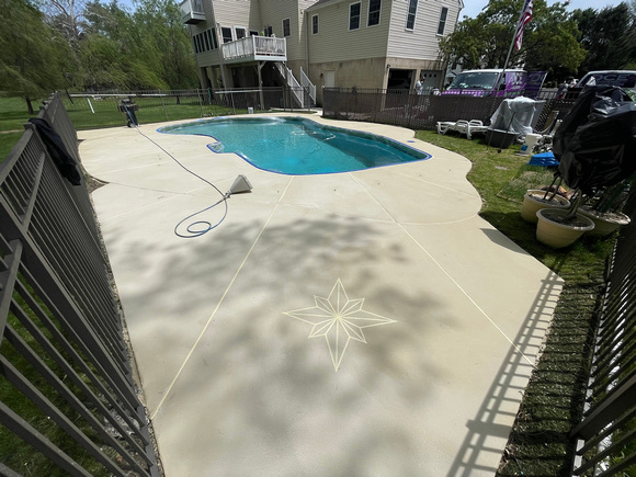 Pool deck using THIN-FINISH™ Decorative Overlay with custom stars to create a unique look by DCE Flooring LLC 11
