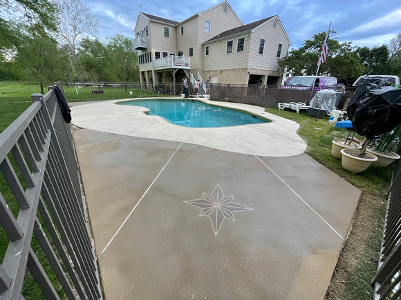 Pool deck using THIN-FINISH™ Decorative Overlay with custom stars to create a unique look by DCE Flooring LLC 6