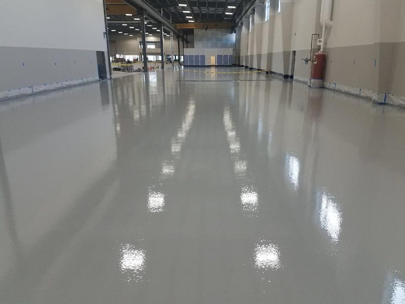 Elite Crete South An E100-PESD™ Electrostatic Dissipative Epoxy Floor was installed in this facility due to its ability to dissipate a 5000 V charge in 0.01 seconds 2